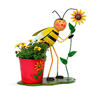 Flower pot with bee figure and sunflower made of metal