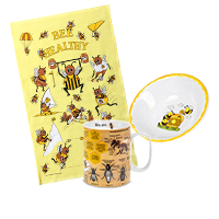 A plate, a bowl and a cup with a bee motif are arranged as a group in the centre