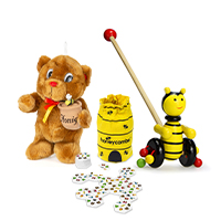 A teddy bear, a game and a wooden push-along bee are arranged side by side in the centre. A teddy bear, a game and a wooden push-along bee are arranged side by side in the centre.