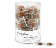 Minkenhus® Honig-Sahne-Lollies in der Spar-Dose, Frontansicht, zwei Lollies liegend daneben