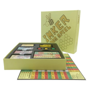 Beekeeper – The Board Game from schhräg at an angle with the lid open so that the game board and the contents of the box are visible. The lid is positioned behind the game.